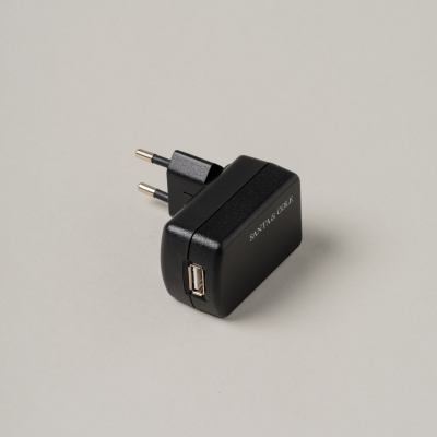 Power adapter with USB port by Santa & Cole